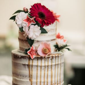white-icing-covered-cake-with-flowers-on-top-5hr1gitc7gs